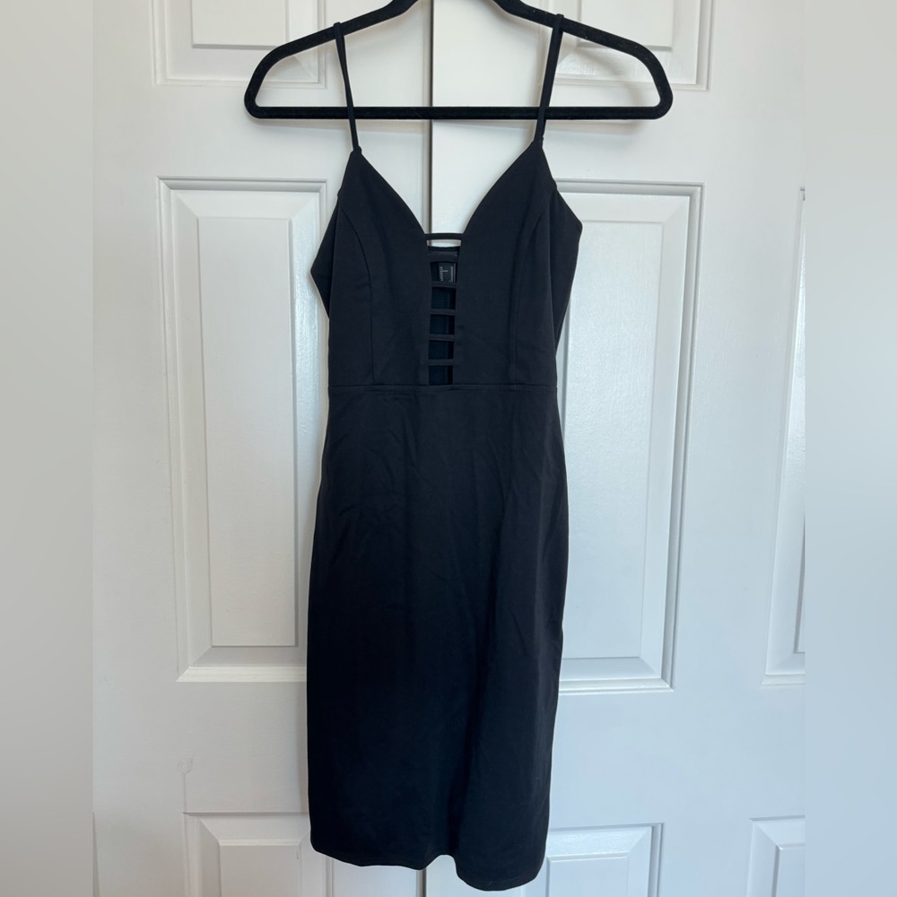 Forever21 black party/clubbing dress with front cutouts (size M)